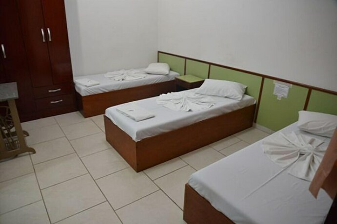 Imagen de la habitación del Hotel Unihotel. Foto 16