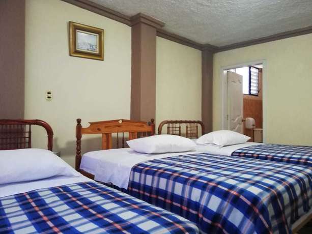 Imagen de la habitación del Hotel Unihotel. Foto 7