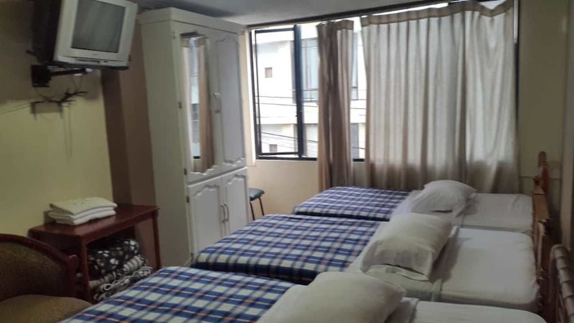 Imagen de la habitación del Hotel Unihotel. Foto 14