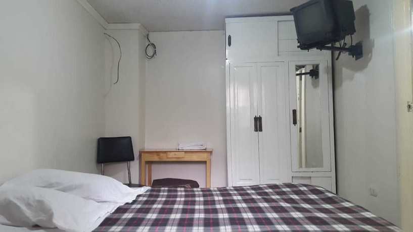 Imagen de la habitación del Hotel Unihotel. Foto 15