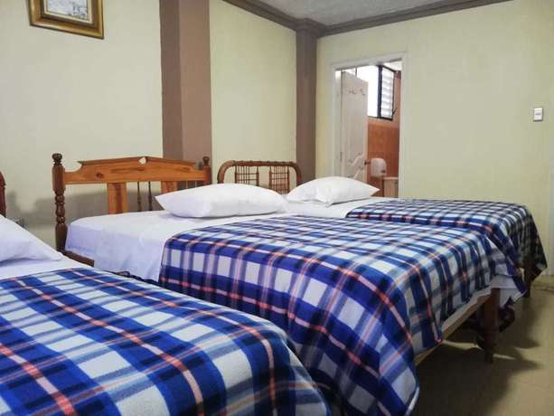 Imagen de la habitación del Hotel Unihotel. Foto 17