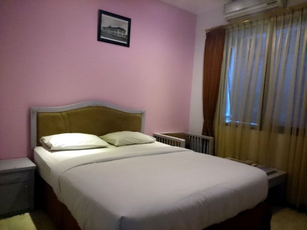 Imagen de la habitación del Hotel Unik, Pasirkaliki. Foto 8