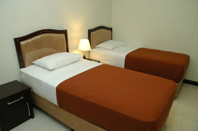 Imagen de la habitación del Hotel Unik, Pasirkaliki. Foto 10
