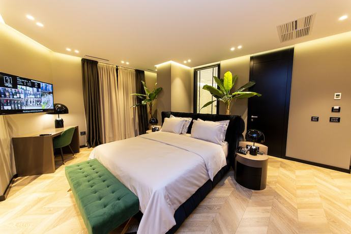 Imagen de la habitación del Hotel Unik, Tirana. Foto 3