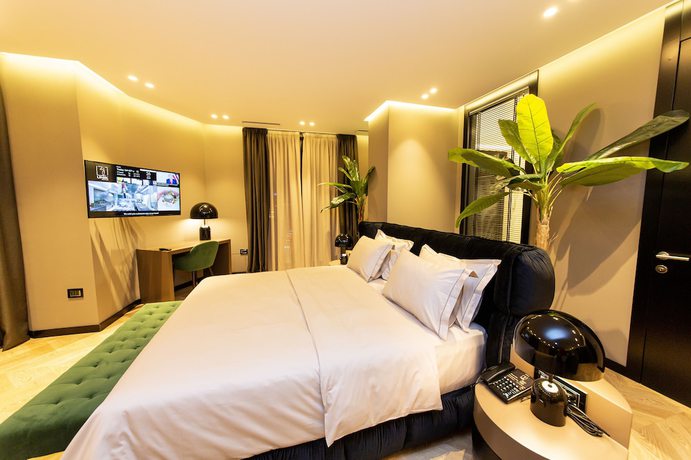 Imagen de la habitación del Hotel Unik, Tirana. Foto 5