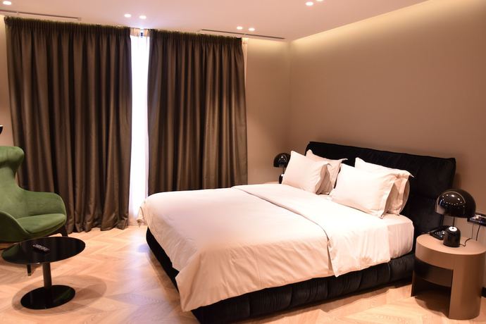 Imagen de la habitación del Hotel Unik, Tirana. Foto 10