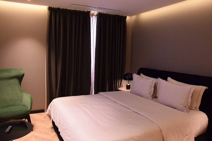 Imagen de la habitación del Hotel Unik, Tirana. Foto 11