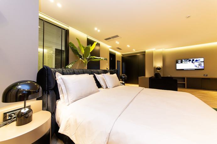 Imagen de la habitación del Hotel Unik, Tirana. Foto 12
