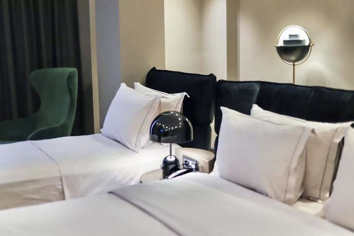 Imagen de la habitación del Hotel Unik, Tirana. Foto 14