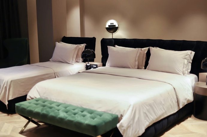 Imagen de la habitación del Hotel Unik, Tirana. Foto 16