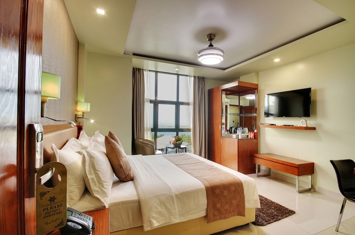 Imagen de la habitación del Hotel Unima Grand. Foto 13