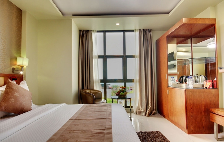 Imagen de la habitación del Hotel Unima Grand. Foto 15