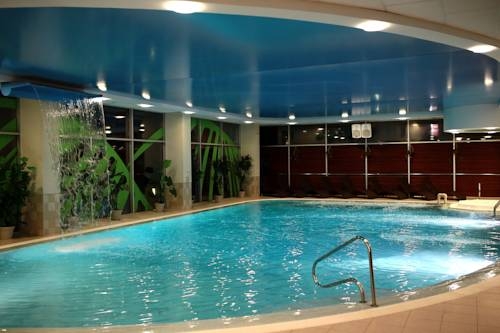 Imagen de la piscina del Hotel Unimars Hotel Riga. Foto 7