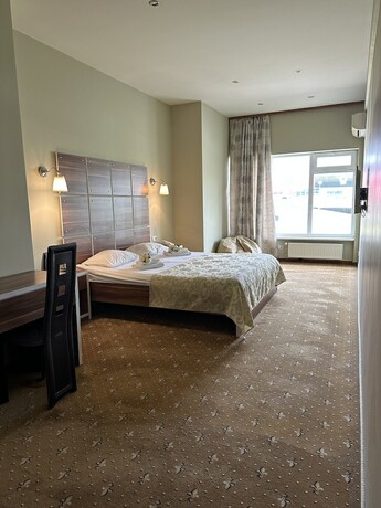 Imagen de la habitación del Hotel Unimars Riga. Foto 14