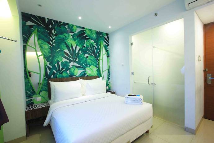 Imagen de la habitación del Hotel Uniq Yogyakarta. Foto 15