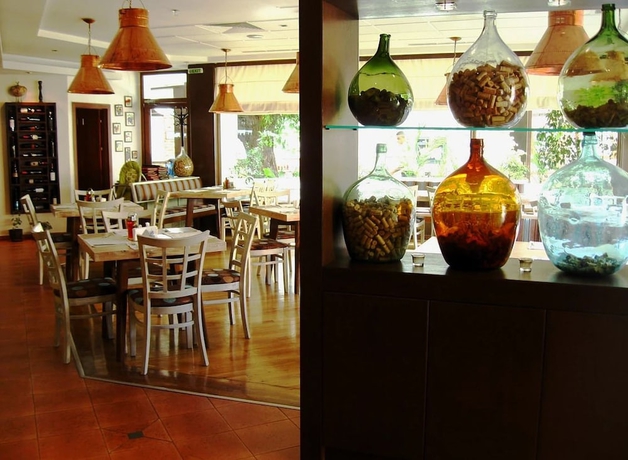 Imagen del bar/restaurante del Hotel Uniqato. Foto 6