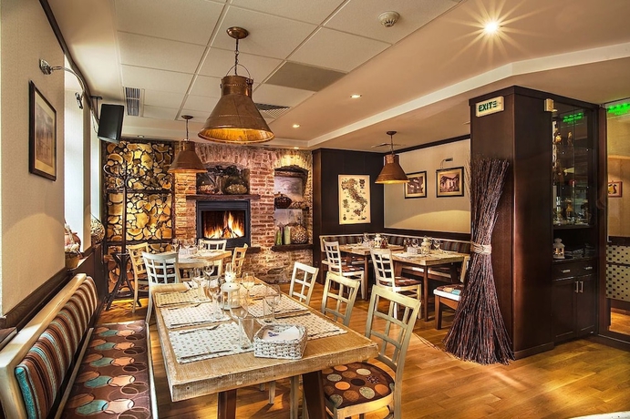 Imagen del bar/restaurante del Hotel Uniqato. Foto 7