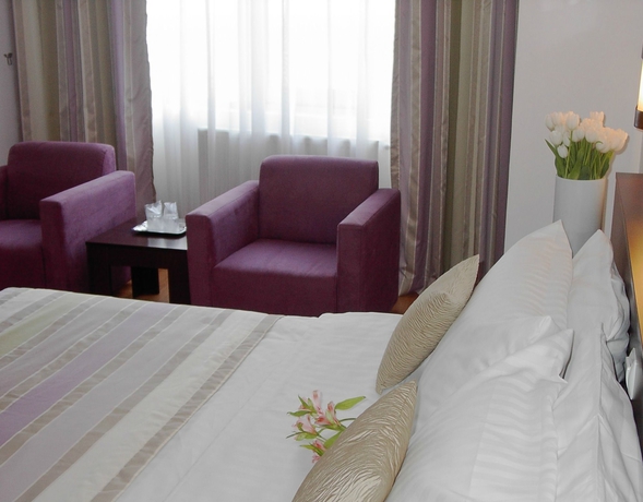 Imagen de la habitación del Hotel Unique Boutique. Foto 5