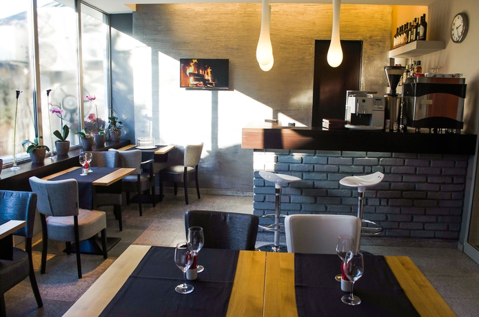 Imagen del bar/restaurante del Hotel Unique Boutique. Foto 3