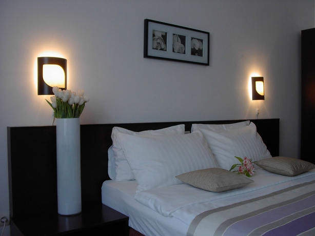 Imagen de la habitación del Hotel Unique Boutique. Foto 11