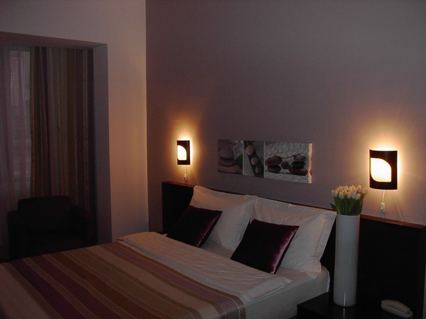 Imagen de la habitación del Hotel Unique Boutique. Foto 13