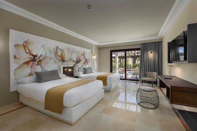 Imagen de la habitación del Hotel Unique Club at Lopesan Costa Meloneras Resort. Foto 19
