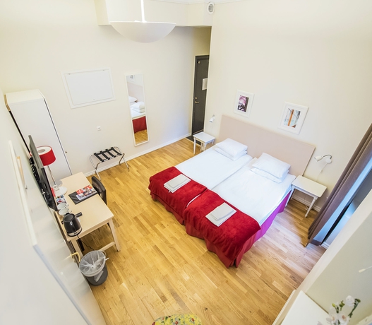 Imagen de la habitación del Hotel Unique, Estocolmo Ciudad. Foto 8