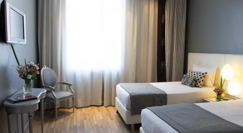 Imagen de la habitación del Hotel Unique Executive Central. Foto 9