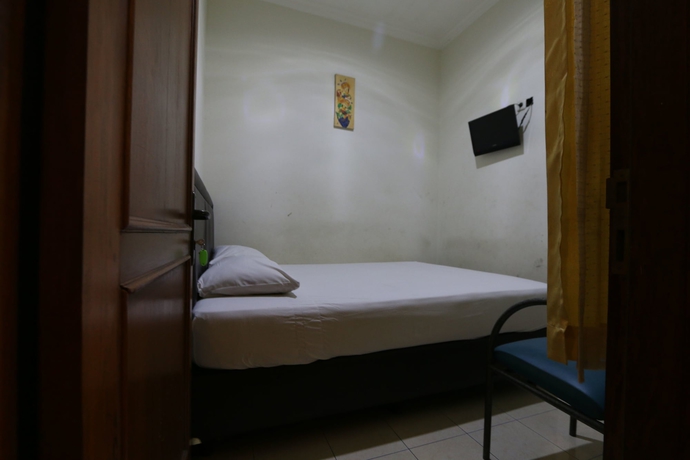 Imagen de la habitación del Hotel Unique Guesthouse. Foto 4