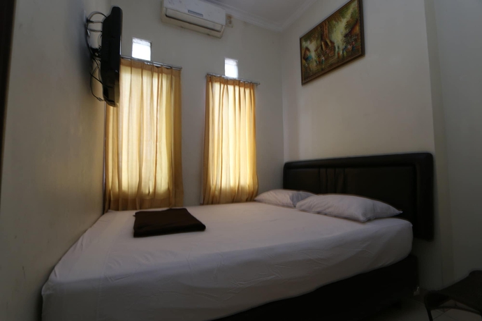 Imagen de la habitación del Hotel Unique Guesthouse. Foto 6
