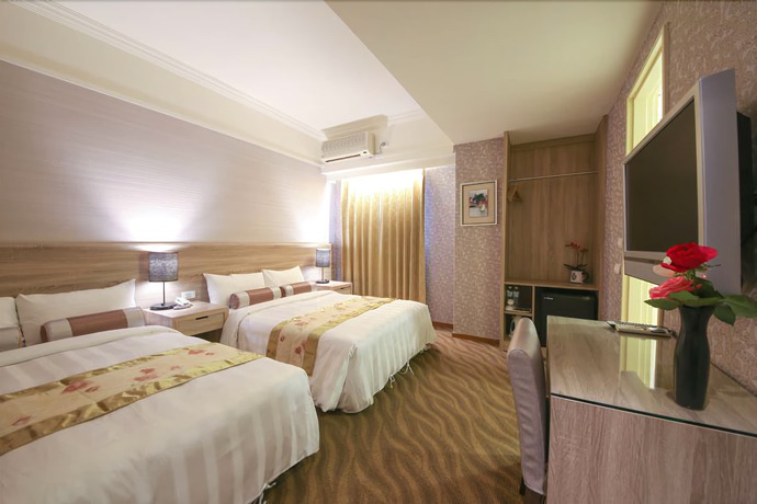 Imagen de la habitación del Hotel Unique Holiday. Foto 3