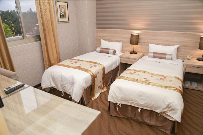 Imagen de la habitación del Hotel Unique Holiday. Foto 4