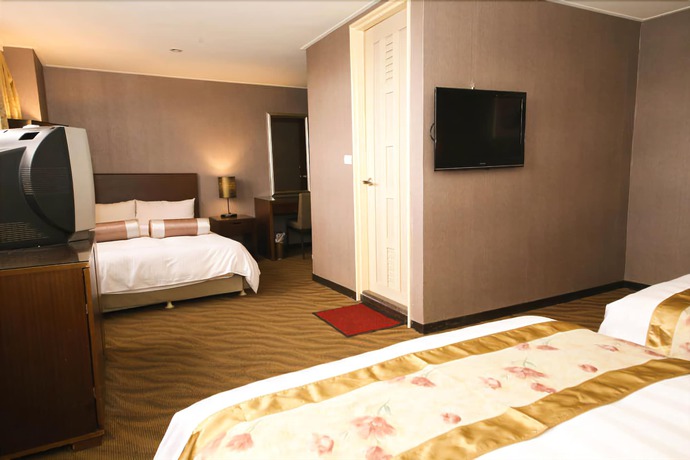 Imagen de la habitación del Hotel Unique Holiday. Foto 5