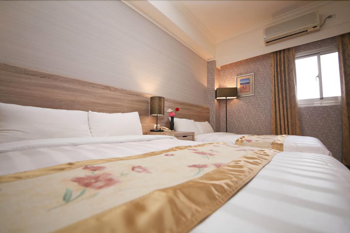 Imagen de la habitación del Hotel Unique Holiday. Foto 7