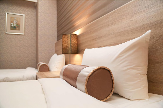 Imagen de la habitación del Hotel Unique Holiday. Foto 8