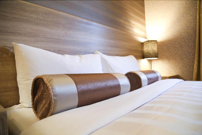 Imagen de la habitación del Hotel Unique Holiday. Foto 10