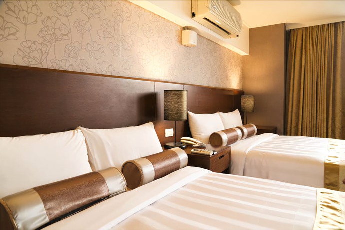 Imagen de la habitación del Hotel Unique Holiday. Foto 12