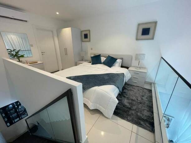 Imagen de la habitación del Hotel Unique Homes By Embassy Gardens. Foto 17