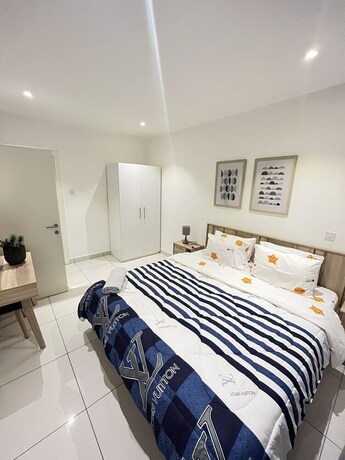 Imagen de la habitación del Hotel Unique Homes By Embassy Gardens. Foto 22