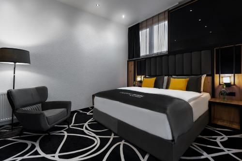 Imagen de la habitación del Hotel Unique Pearl. Foto 15