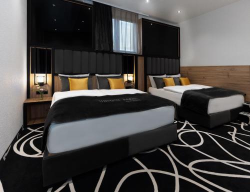 Imagen de la habitación del Hotel Unique Pearl. Foto 17