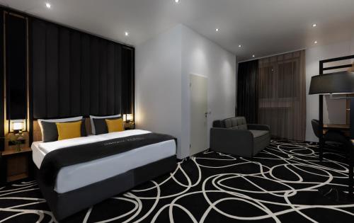 Imagen de la habitación del Hotel Unique Pearl. Foto 20