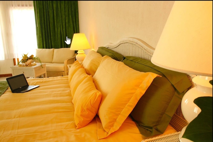 Imagen de la habitación del Hotel Unique Village Resort. Foto 3