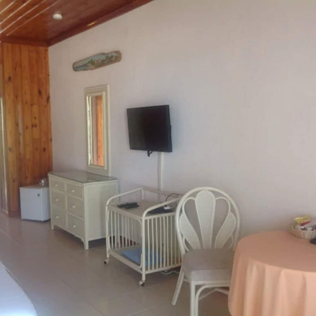 Imagen de la habitación del Hotel Unique Village Resort. Foto 6