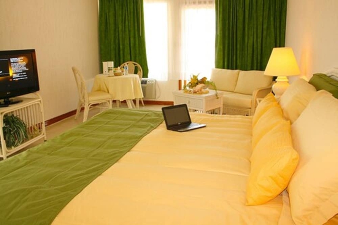 Imagen de la habitación del Hotel Unique Village Resort. Foto 9
