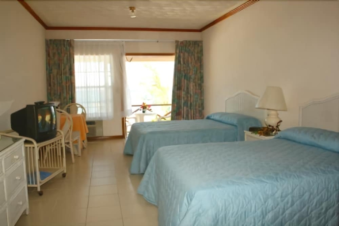 Imagen de la habitación del Hotel Unique Village Resort. Foto 11