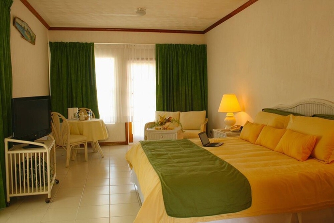 Imagen de la habitación del Hotel Unique Village Resort. Foto 15