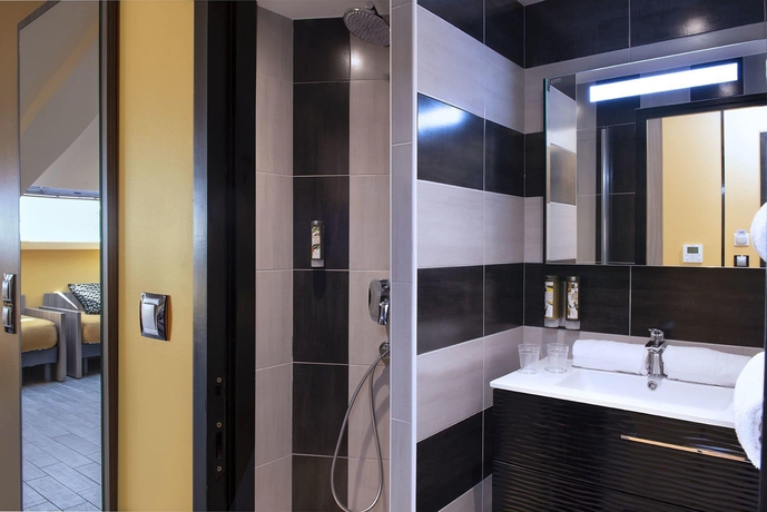 Imagen de la habitación del Hotel Unique and Residence. Foto 11