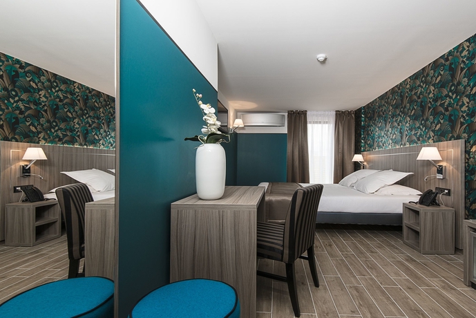 Imagen de la habitación del Hotel Unique and Residence. Foto 13