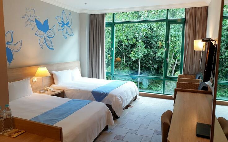 Imagen de la habitación del Hotel Uni-resort Mawutu. Foto 29